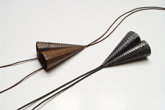 12 ‘Pointed’ pendant 1993. bronze and blackened silver, 8x6cm